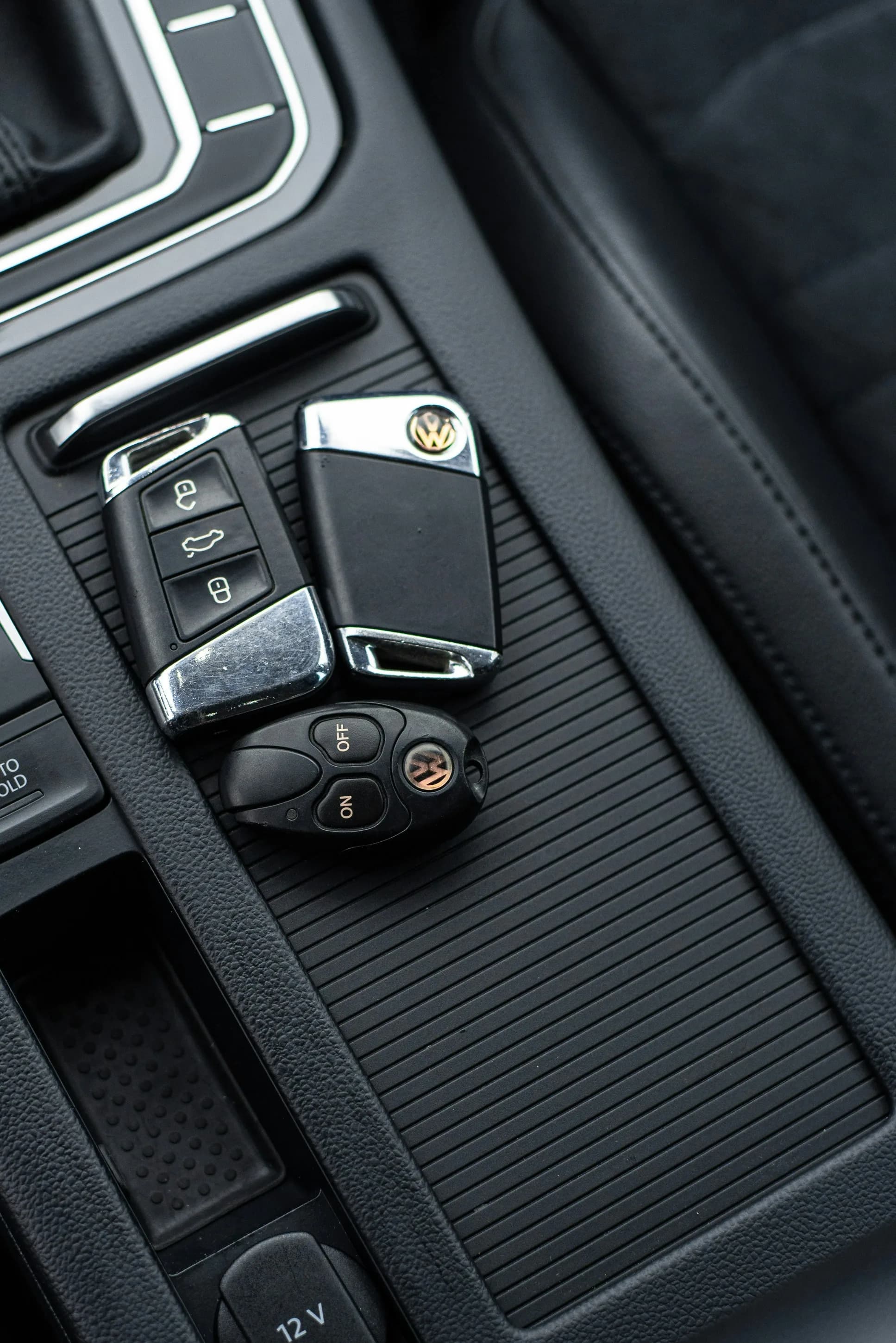 Car key fobs on a center console